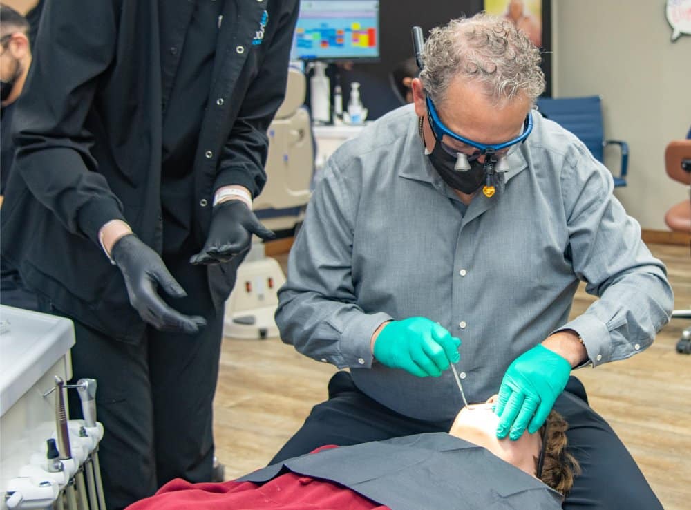 Dr Harwell working on a patient. | Harwell & Cook Orthodontics